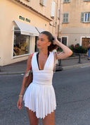 Rhiannon | Pleated Plunge Mini Dress – V Neck Ruched Waist Contrast Trim Summer Party